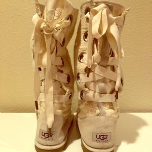 Lace up ugg boots size 8.